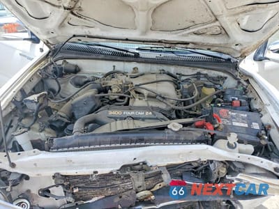Zdjęcie 11 z 12 samochodu: 2000 TOYOTA TACOMA XTRACAB LIMITED VIN:4TAWN74N5YZ644753 - miniatura