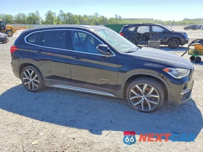 Czwarte zdjęcie samochodu z boku: 2017 BMW X1 XDRIVE28I VIN:WBXHT3Z31H4A57214 - miniatura