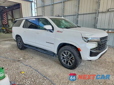 Czwarte zdjęcie samochodu z boku: 2024 CHEVROLET SUBURBAN K1500 Z71 VIN:1GNSKDKD6RR297947 - miniatura