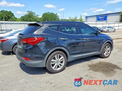 Trzecie zdjęcie samochodu z tyłu: 2014 HYUNDAI SANTA FE SPORT 2.0T VIN:5XYZUDLA5EG210697 - miniatura
