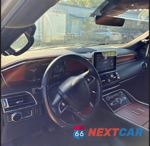 Zdjęcie 9 z 10 samochodu: 2020 LINCOLN NAVIGATOR RESERVE VIN:5LMJJ2LT0LEL22530 - miniatura