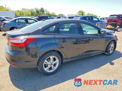 Trzecie zdjęcie samochodu z tyłu: 2013 FORD FOCUS SE VIN:1FADP3F25DL274716 - miniatura