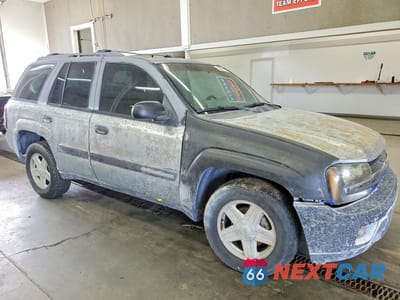 Czwarte zdjęcie samochodu z boku: 2003 CHEVROLET TRAILBLAZER VIN:1GNDT13S232279902 - miniatura