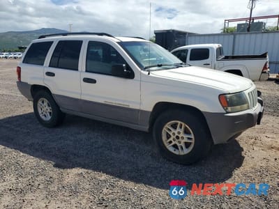 Czwarte zdjęcie samochodu z boku: 2004 JEEP GRAND CHEROKEE LAREDO VIN:1J4GW48N84C378439 - miniatura