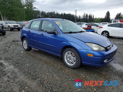 Czwarte zdjęcie samochodu z boku: 2004 FORD FOCUS ZX5 VIN:3FAFP37304R112400 - miniatura