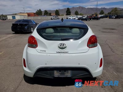 Zdjęcie 6 z 12 samochodu: 2013 HYUNDAI VELOSTER BASE VIN:KMHTC6AD6DU175498 - miniatura