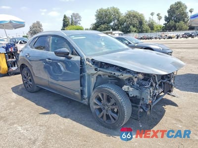 Czwarte zdjęcie samochodu z boku: 2023 MAZDA CX-30 PREFERRED VIN:3MVDMBCM5PM582649 - miniatura