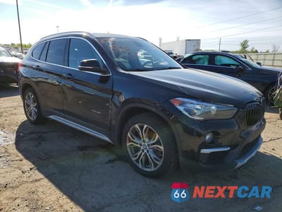 Czwarte zdjęcie samochodu z boku: 2017 BMW X1 XDRIVE28I VIN:WBXHT3C36H5F76696 - miniatura