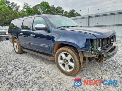 Czwarte zdjęcie samochodu z boku: 2007 CHEVROLET SUBURBAN K1500 VIN:3GNFK16397G293731 - miniatura