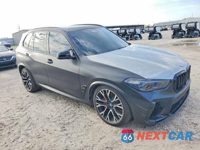 Czwarte zdjęcie samochodu z boku: 2022 BMW X5 M VIN:5YMJU0C02N9L56562 - miniatura