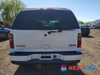 Zdjęcie 6 z 13 samochodu: 2004 GMC YUKON DENALI VIN:1GKEK63U24J274192 - miniatura