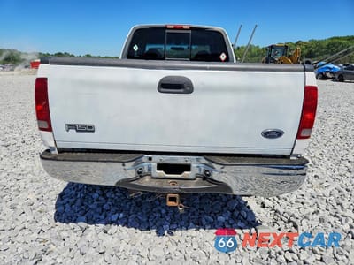 Zdjęcie 6 z 12 samochodu: 2000 FORD F-150 VIN:2FTRX18L2YCB02783 - miniatura
