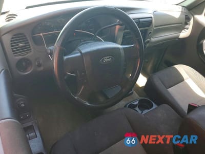 Zdjęcie 8 z 13 samochodu: 2011 FORD RANGER SUPER CAB VIN:1FTKR4EE0BPA83224 - miniatura