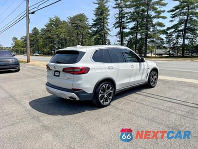 Czwarte zdjęcie samochodu z boku: 2022 BMW X5 XDRIVE45E VIN:5UXTA6C03N9J62196 - miniatura