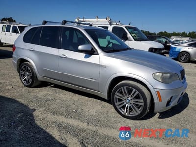 Czwarte zdjęcie samochodu z boku: 2011 BMW X5 XDRIVE35I VIN:5UXZV4C50BL407713 - miniatura