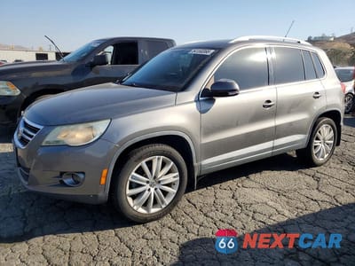 2011 VOLKSWAGEN TIGUAN S WVGAV7AX1BW509259 - główne zdjęcie licytacji z USA - miniatura
