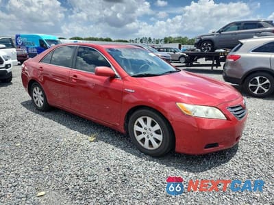 Czwarte zdjęcie samochodu z boku: 2009 TOYOTA CAMRY HYBRID BASE VIN:4T1BB46K19U104713 - miniatura