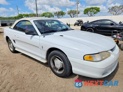 Czwarte zdjęcie samochodu z boku: 1994 FORD MUSTANG VIN:1FALP4443RF133719 - miniatura