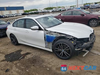 Czwarte zdjęcie samochodu z boku: 2019 BMW 330XI VIN:WBA5R7C50KAJ87486 - miniatura