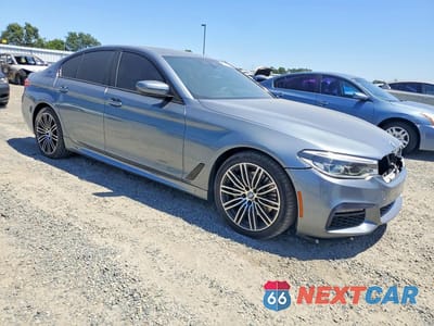 Czwarte zdjęcie samochodu z boku: 2019 BMW 530E VIN:WBAJA9C58KB399130 - miniatura