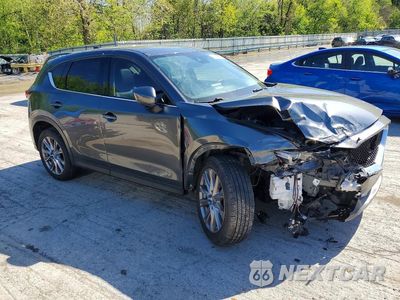 Czwarte zdjęcie samochodu z boku: 2019 MAZDA CX-5 GRAND TOURING VIN:JM3KFBDMXK0620347 - miniatura