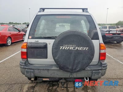 Zdjęcie 6 z 13 samochodu: 1999 CHEVROLET TRACKER VIN:2CNBJ13C8X6917086 - miniatura