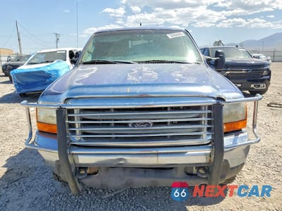 Piąte zdjęcie samochodu w środku: 1999 FORD F250 SUPER DUTY VIN:1FTNX21FXXEA01685 - miniatura