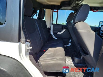 Zdjęcie 11 z 13 samochodu: 2015 JEEP WRANGLER UNLIMITED RUBICON VIN:1C4BJWFG4FL769010 - miniatura