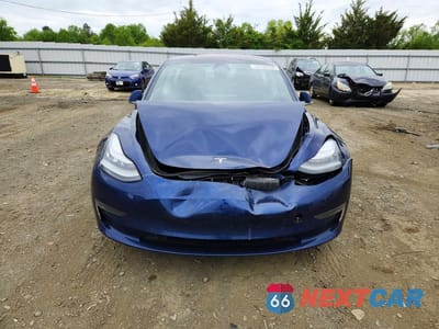 Piąte zdjęcie samochodu w środku: 2018 TESLA MODEL 3 VIN:5YJ3E1EB9JF093621 - miniatura