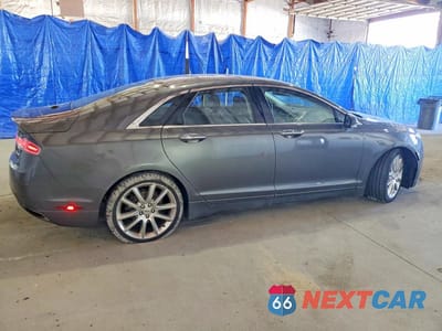 Trzecie zdjęcie samochodu z tyłu: 2016 LINCOLN MKZ VIN:3LN6L2G91GR618922 - miniatura