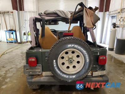 Zdjęcie 6 z 13 samochodu: 1998 JEEP WRANGLER / TJ SE VIN:1J4FY29P6WP770356 - miniatura