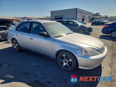 Czwarte zdjęcie samochodu z boku: 2000 HONDA CIVIC BASE VIN:2HGEJ6619YH598572 - miniatura
