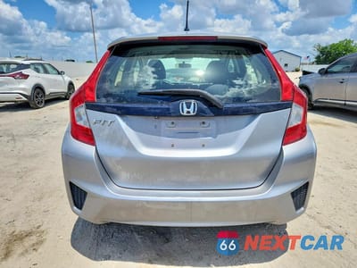 Zdjęcie 6 z 12 samochodu: 2017 HONDA FIT LX VIN:JHMGK5H52HS000490 - miniatura