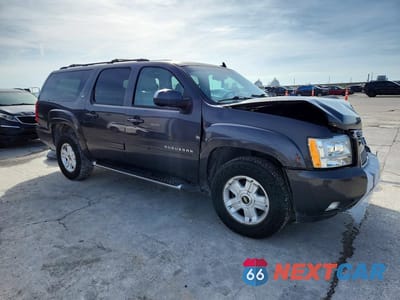 Czwarte zdjęcie samochodu z boku: 2010 CHEVROLET SUBURBAN K1500 LT VIN:1GNUKJE32AR223178 - miniatura