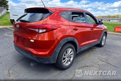Czwarte zdjęcie samochodu z boku: 2016 HYUNDAI TUCSON SE VIN:KM8J33A43GU117066 - miniatura