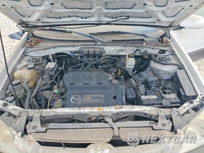 Zdjęcie 12 z 13 samochodu: 2003 MAZDA TRIBUTE VIN:4F2YZ04105KM08618 - miniatura