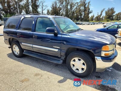 Czwarte zdjęcie samochodu z boku: 2004 GMC YUKON VIN:1GKEC13TX4R259125 - miniatura