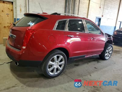 Trzecie zdjęcie samochodu z tyłu: 2016 CADILLAC SRX PERFORMANCE COLLECTION VIN:3GYFNCE36GS578004 - miniatura