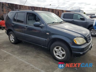 Czwarte zdjęcie samochodu z boku: 2001 MERCEDES-BENZ ML 320 VIN:4JGAB54E21A253913 - miniatura