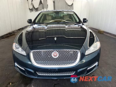 Piąte zdjęcie samochodu w środku: 2013 JAGUAR XJL PORTFOLIO VIN:SAJWA2GB1DLV42711 - miniatura