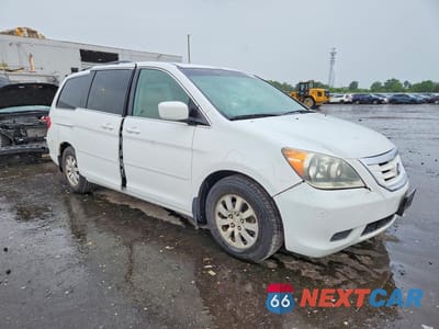 Czwarte zdjęcie samochodu z boku: 2010 HONDA ODYSSEY EXL VIN:5FNRL3H66AB010124 - miniatura