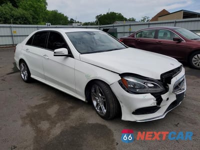 Czwarte zdjęcie samochodu z boku: 2016 MERCEDES-BENZ E 350 VIN:WDDHF5KB3GB170631 - miniatura
