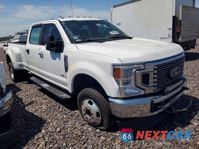 Czwarte zdjęcie samochodu z boku: 2020 FORD F350 SUPER DUTY VIN:1FT8W3DT4LEC18182 - miniatura