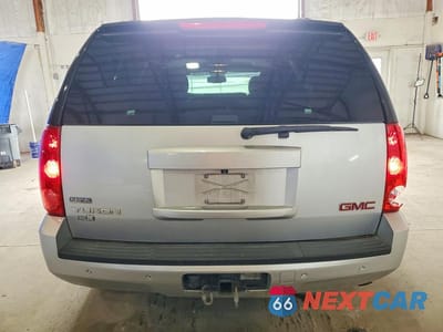 Zdjęcie 6 z 13 samochodu: 2011 GMC YUKON SLE VIN:1GKS1AE04BR394903 - miniatura