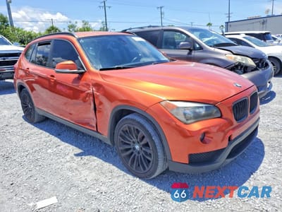 Czwarte zdjęcie samochodu z boku: 2013 BMW X1 SDRIVE28I VIN:WBAVM1C54DVW44999 - miniatura