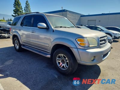 Czwarte zdjęcie samochodu z boku: 2003 TOYOTA SEQUOIA SR5 VIN:5TDZT34A73S167637 - miniatura