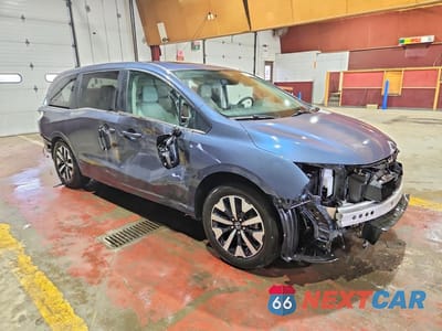 Czwarte zdjęcie samochodu z boku: 2025 HONDA ODYSSEY EXL VIN:5FNRL6H69SB057957 - miniatura