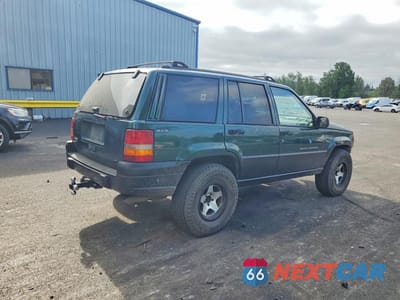 Trzecie zdjęcie samochodu z tyłu: 1998 JEEP GRAND CHEROKEE LAREDO VIN:1J4GZ58S2WC284191 - miniatura