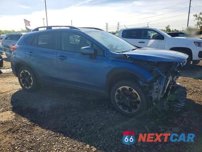 Czwarte zdjęcie samochodu z boku: 2022 SUBARU CROSSTREK PREMIUM VIN:JF2GTACC0NG285476 - miniatura