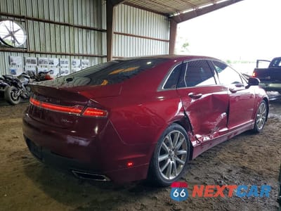 Trzecie zdjęcie samochodu z tyłu: 2016 LINCOLN MKZ VIN:3LN6L2G97GR629133 - miniatura